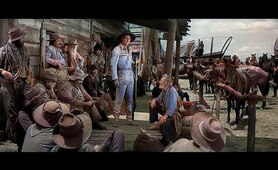 John Wayne leads hundreds of settlers in covered wagons from the Mississippi River. Western Movie